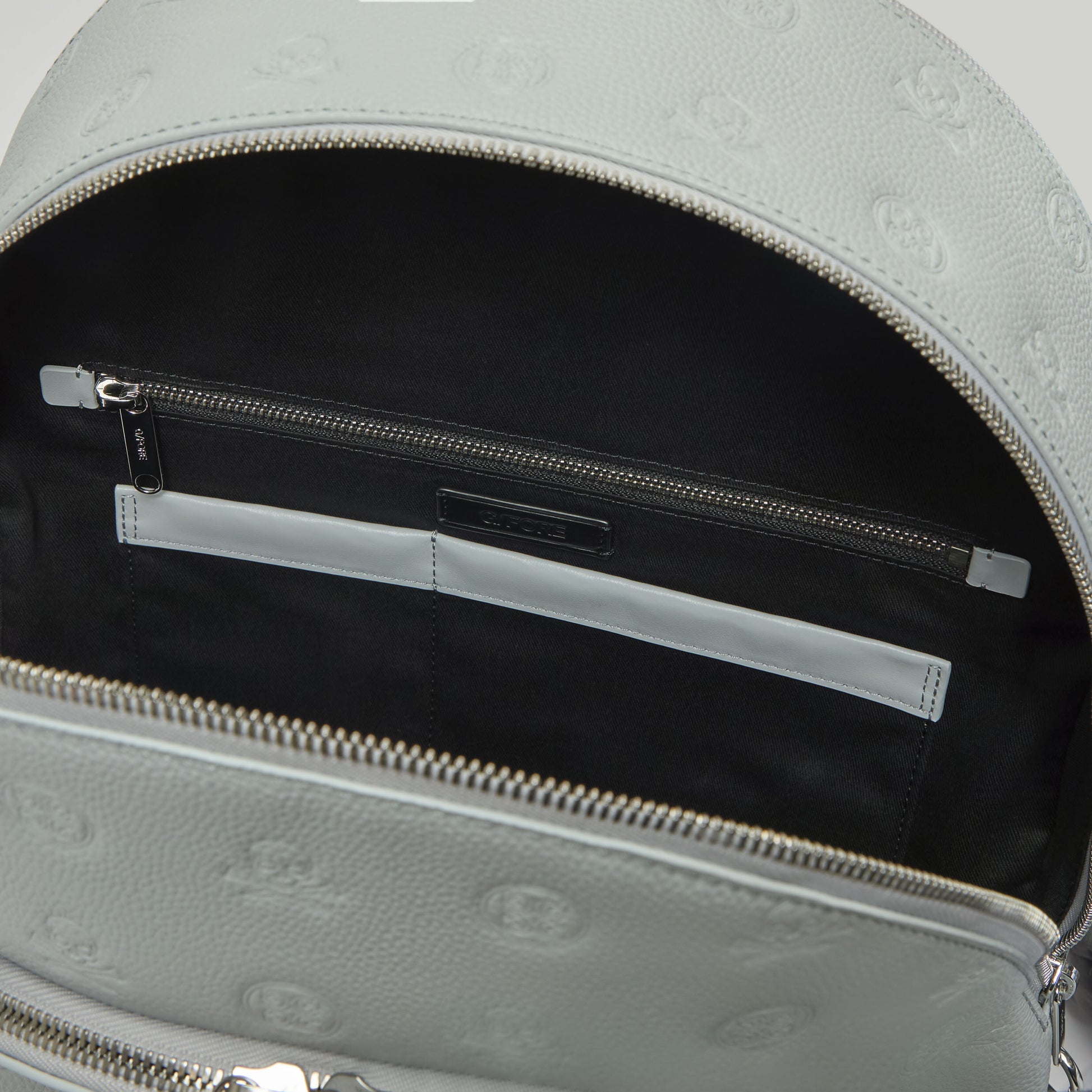 G/FORE EMBOSSED SKULL & TEES LEATHER BACKPACK
